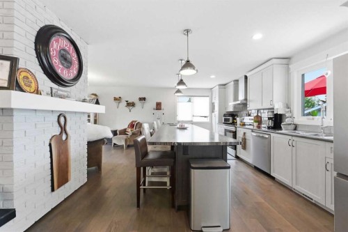 2406 26 Street, Nanton, AB - Indoor Photo Showing Kitchen With Upgraded Kitchen