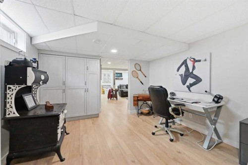 2406 26 Street, Nanton, AB - Indoor Photo Showing Gym Room
