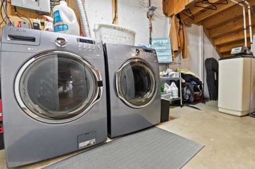 2406 26 Street, Nanton, AB - Indoor Photo Showing Laundry Room