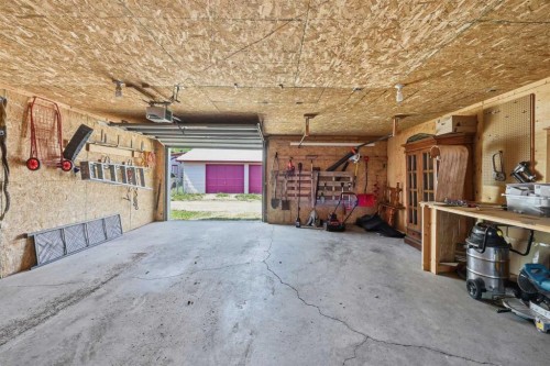 2406 26 Street, Nanton, AB - Indoor Photo Showing Garage
