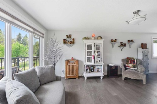 2406 26 Street, Nanton, AB - Indoor Photo Showing Living Room