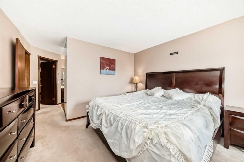 232 Macewan Ridge Close Nw, Calgary, AB - Indoor Photo Showing Bedroom
