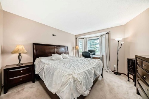 232 Macewan Ridge Close Nw, Calgary, AB - Indoor Photo Showing Bedroom