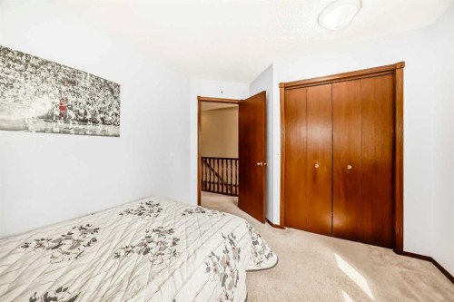 232 Macewan Ridge Close Nw, Calgary, AB - Indoor Photo Showing Bedroom