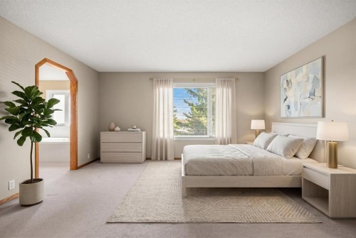 131 Lake Simcoe Court Se, Calgary, AB - Indoor Photo Showing Bedroom