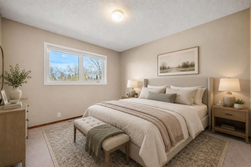 131 Lake Simcoe Court Se, Calgary, AB - Indoor Photo Showing Bedroom