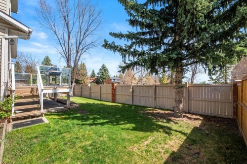 131 Lake Simcoe Court Se, Calgary, AB - Outdoor With Backyard