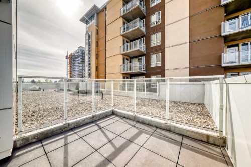 310-1107 Gladstone Road Nw, Calgary, AB - Outdoor With Exterior