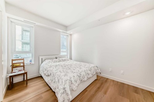 310-1107 Gladstone Road Nw, Calgary, AB - Indoor Photo Showing Bedroom