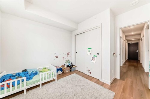 310-1107 Gladstone Road Nw, Calgary, AB - Indoor Photo Showing Bedroom