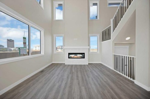 846 Chelsea Village South, Chestermere, AB - Indoor With Fireplace
