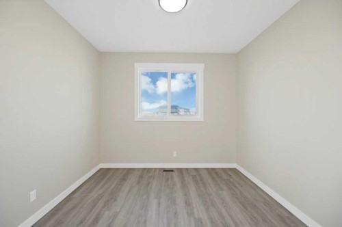 846 Chelsea Village South, Chestermere, AB - Indoor Photo Showing Other Room