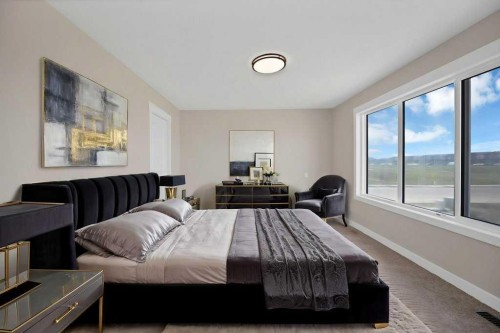 846 Chelsea Village South, Chestermere, AB - Indoor Photo Showing Bedroom
