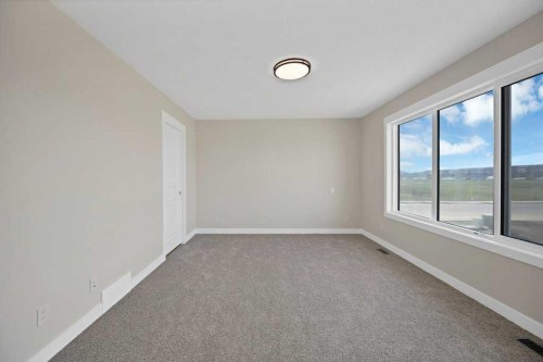 846 Chelsea Village South, Chestermere, AB - Indoor Photo Showing Other Room