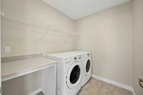 846 Chelsea Village South, Chestermere, AB - Indoor Photo Showing Laundry Room