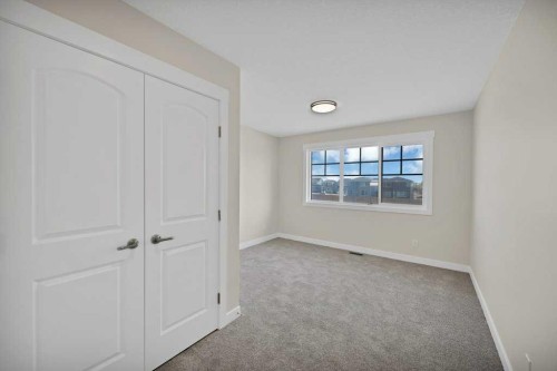 846 Chelsea Village South, Chestermere, AB - Indoor Photo Showing Other Room