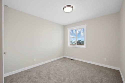 846 Chelsea Village South, Chestermere, AB - Indoor Photo Showing Other Room