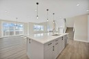 846 Chelsea Village South, Chestermere, AB  - Indoor Photo Showing Kitchen With Double Sink With Upgraded Kitchen 