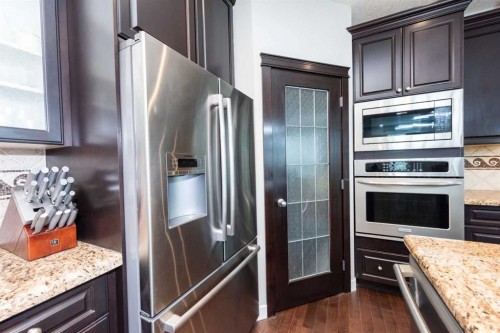 35 Aspen Stone Way Sw, Calgary, AB - Indoor Photo Showing Kitchen With Stainless Steel Kitchen With Upgraded Kitchen