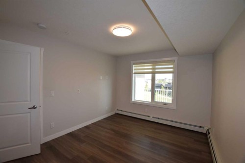 2318-6118 80 Avenue Ne, Calgary, AB - Indoor Photo Showing Other Room