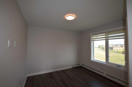 2318-6118 80 Avenue Ne, Calgary, AB - Indoor Photo Showing Other Room