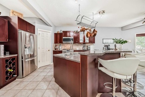 188 Chapala Drive Se, Calgary, AB - Indoor Photo Showing Kitchen With Double Sink