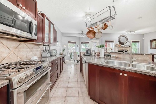 188 Chapala Drive Se, Calgary, AB - Indoor Photo Showing Kitchen With Double Sink