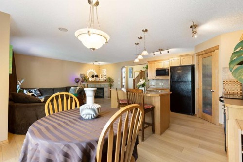 34 Tuscany Meadows Drive Nw, Calgary, AB - Indoor Photo Showing Dining Room