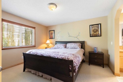 34 Tuscany Meadows Drive Nw, Calgary, AB - Indoor Photo Showing Bedroom