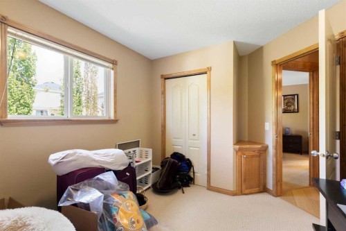 34 Tuscany Meadows Drive Nw, Calgary, AB - Indoor Photo Showing Bedroom