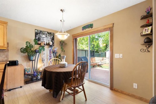 34 Tuscany Meadows Drive Nw, Calgary, AB - Indoor Photo Showing Dining Room