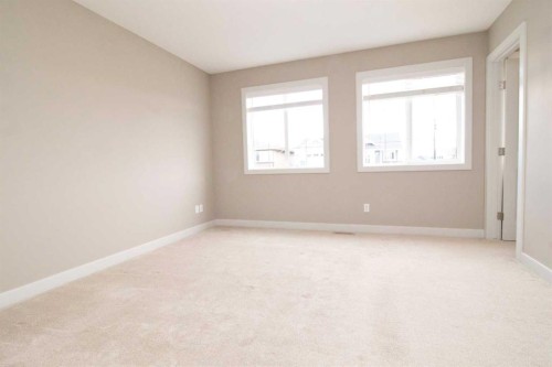 3 Sunrise Heights, Cochrane, AB - Indoor Photo Showing Other Room