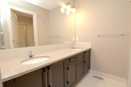 3 Sunrise Heights, Cochrane, AB - Indoor Photo Showing Bathroom
