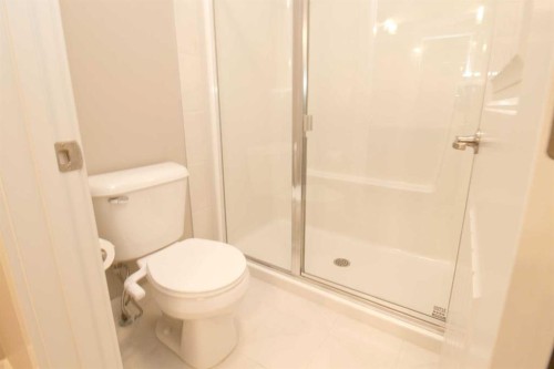 3 Sunrise Heights, Cochrane, AB - Indoor Photo Showing Bathroom
