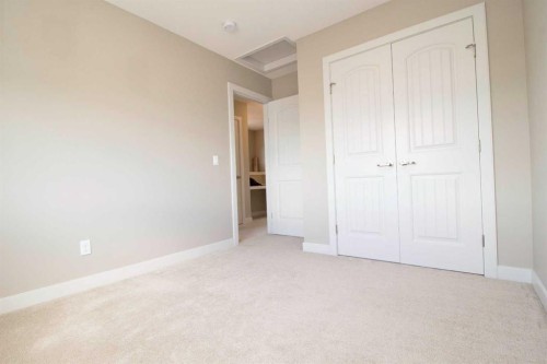 3 Sunrise Heights, Cochrane, AB - Indoor Photo Showing Other Room