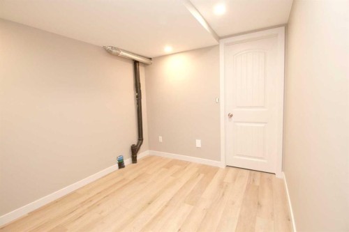 3 Sunrise Heights, Cochrane, AB - Indoor Photo Showing Other Room