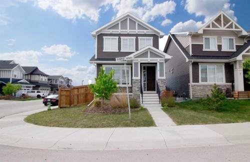 3 Sunrise Heights, Cochrane, AB - Outdoor With Facade