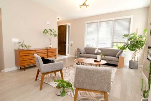 3 Sunrise Heights, Cochrane, AB - Indoor Photo Showing Living Room