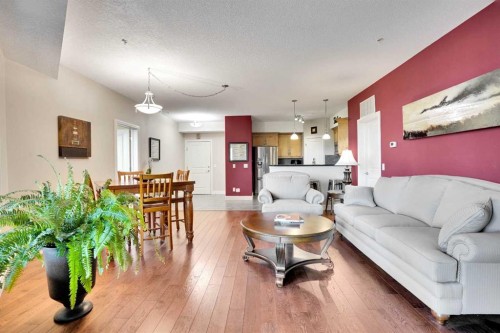 1132-2330 Fish Creek Boulevard Sw, Calgary, AB - Indoor Photo Showing Living Room