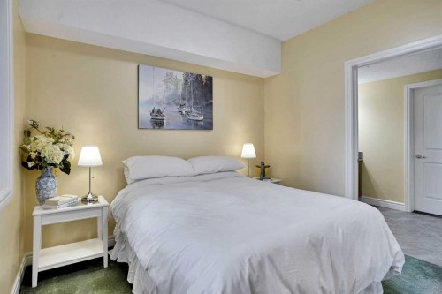 1132-2330 Fish Creek Boulevard Sw, Calgary, AB - Indoor Photo Showing Bedroom