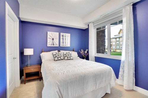 1132-2330 Fish Creek Boulevard Sw, Calgary, AB - Indoor Photo Showing Bedroom