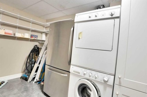 1132-2330 Fish Creek Boulevard Sw, Calgary, AB - Indoor Photo Showing Laundry Room