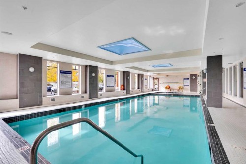 1132-2330 Fish Creek Boulevard Sw, Calgary, AB - Indoor Photo Showing Other Room With In Ground Pool