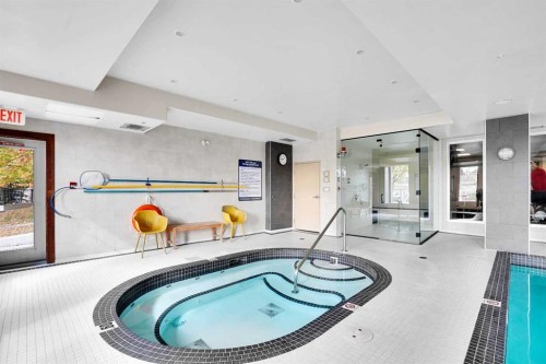 1132-2330 Fish Creek Boulevard Sw, Calgary, AB - Indoor Photo Showing Other Room With In Ground Pool