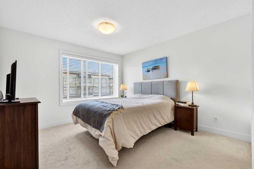 33-230 Seton Passage Se, Calgary, AB - Indoor Photo Showing Bedroom