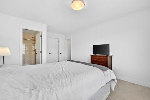 33-230 Seton Passage Se, Calgary, AB - Indoor Photo Showing Bedroom