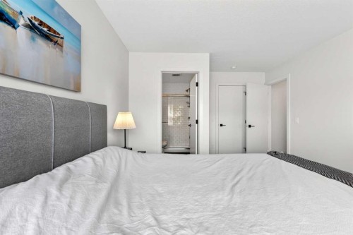 33-230 Seton Passage Se, Calgary, AB - Indoor Photo Showing Bedroom
