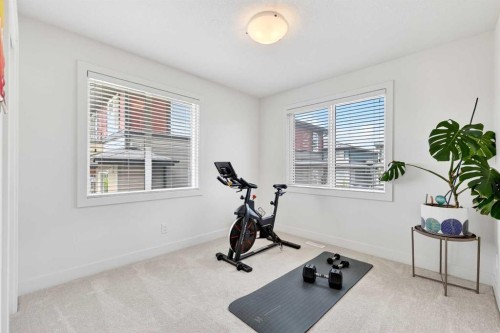 33-230 Seton Passage Se, Calgary, AB - Indoor Photo Showing Gym Room