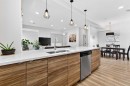 33-230 Seton Passage Se, Calgary, AB  - Indoor Photo Showing Kitchen With Double Sink With Upgraded Kitchen 