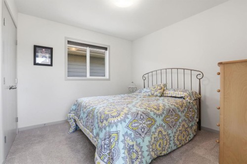 341 Marquis Heights Se, Calgary, AB - Indoor Photo Showing Bedroom
